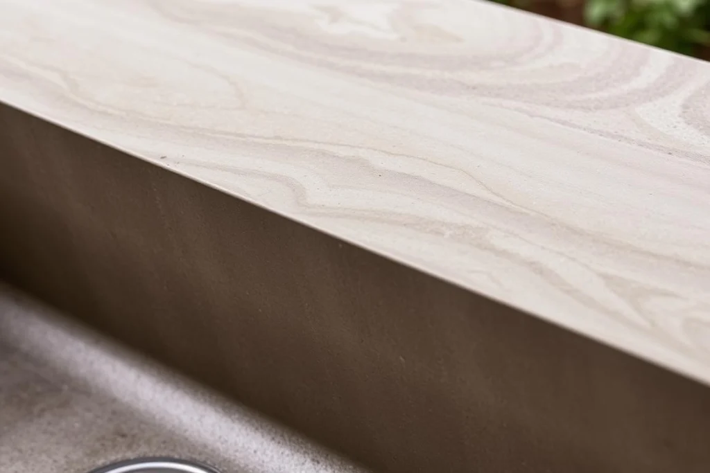 Close-up of a concrete outdoor sink showing texture and color variations Close-up of a concrete outdoor sink showing texture and color variations